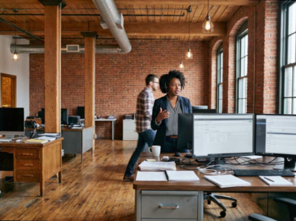 A recruiter on a call at her desk